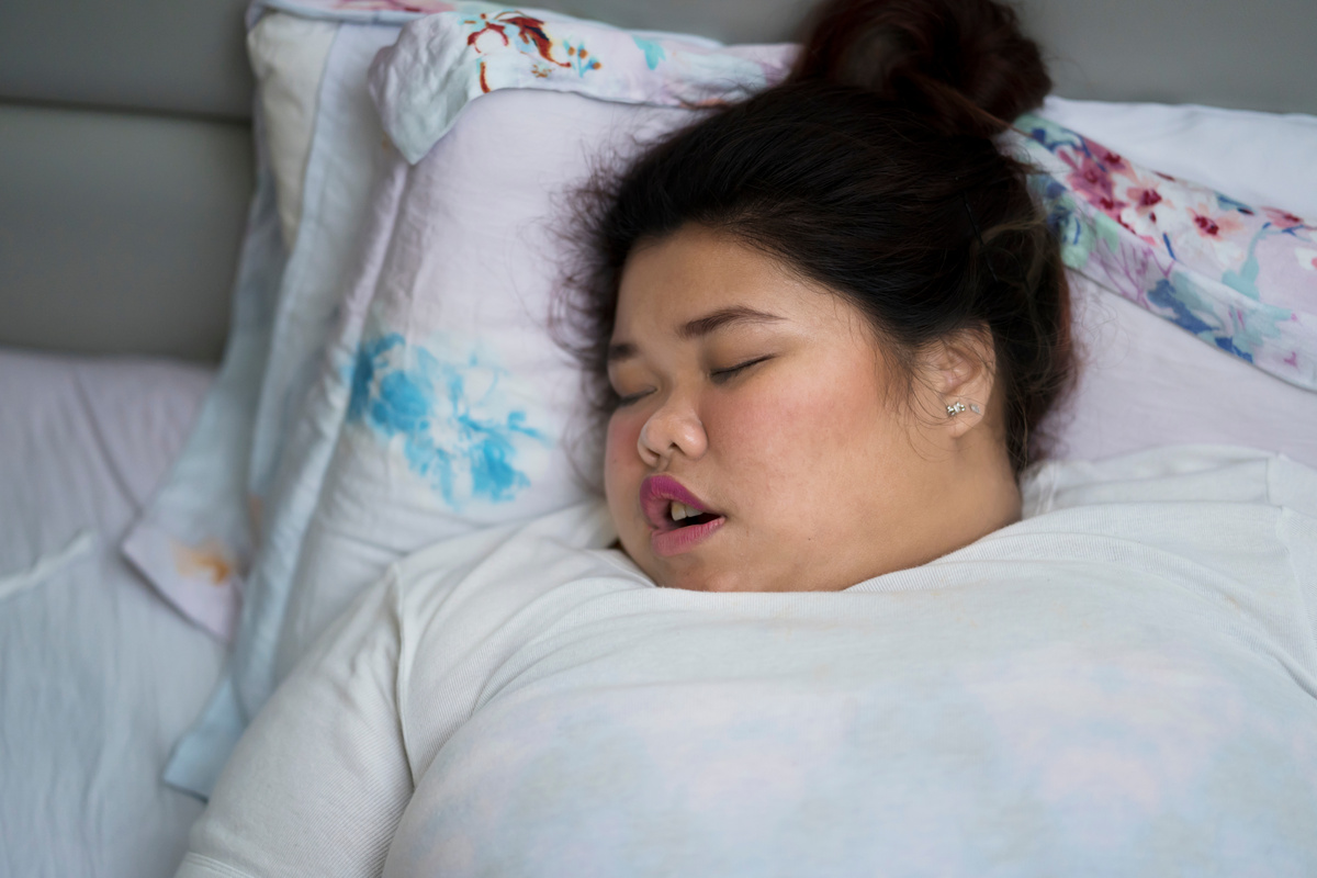 Overweight Woman Sleeping with Open Mouth, Snoring